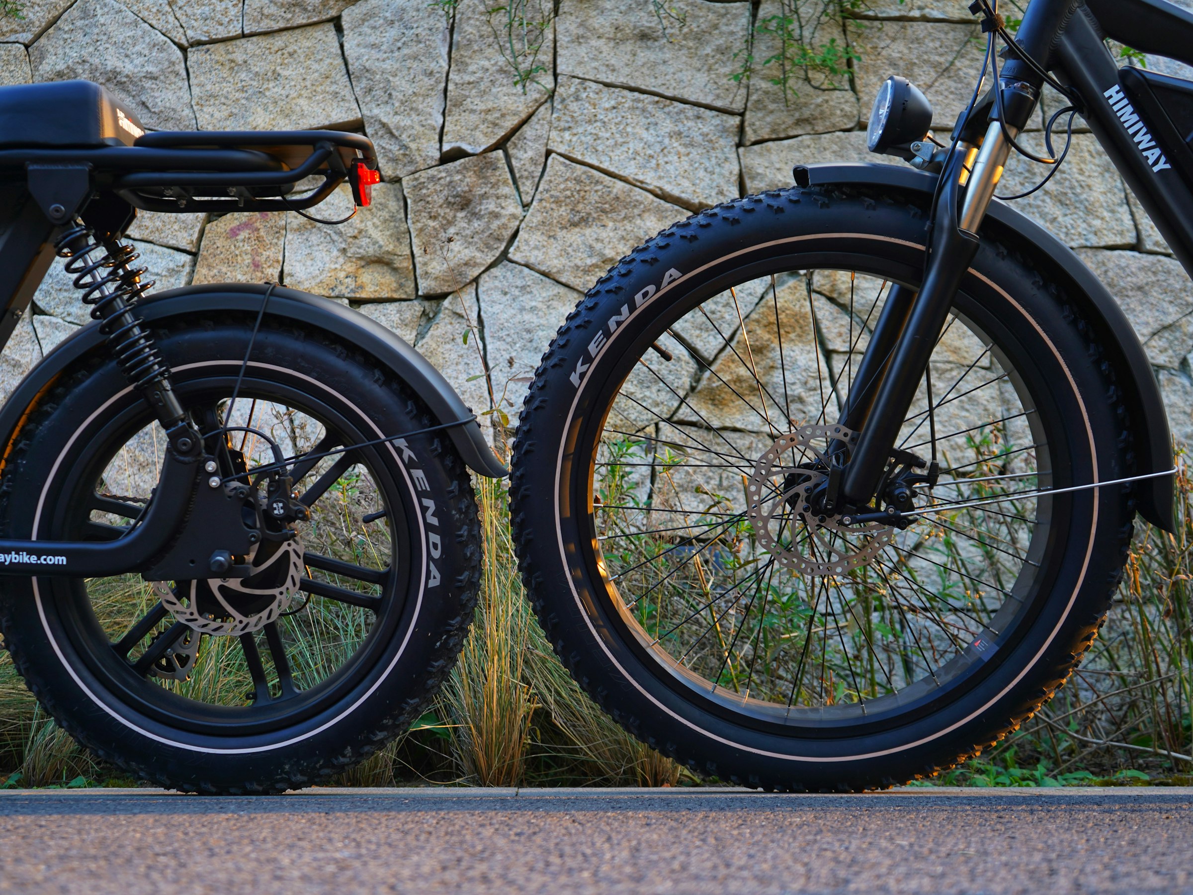 Close-up comparison of a fat tire electric bike's wide tires