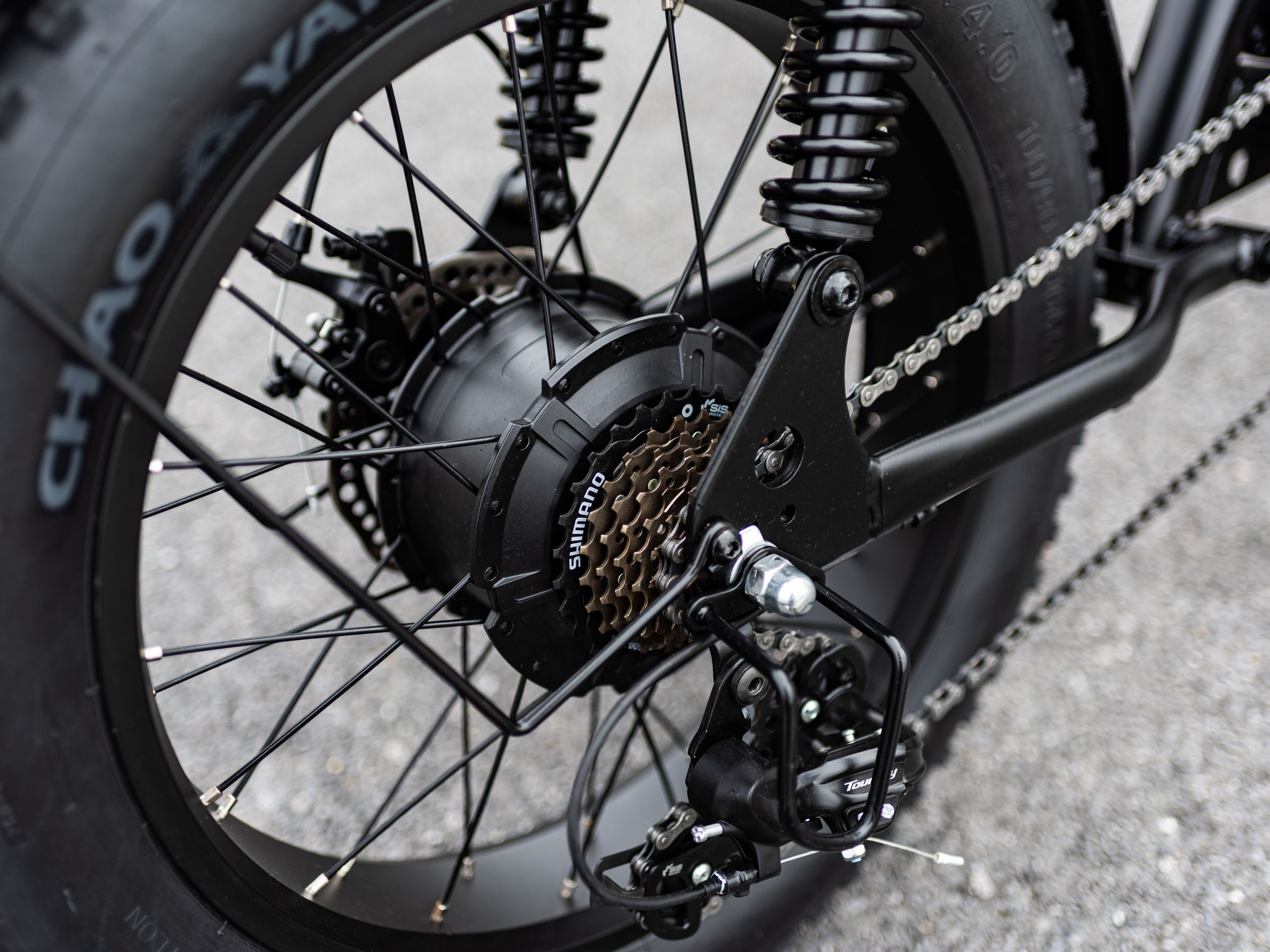 Close-up of an electric bike rear hub motor and cassette