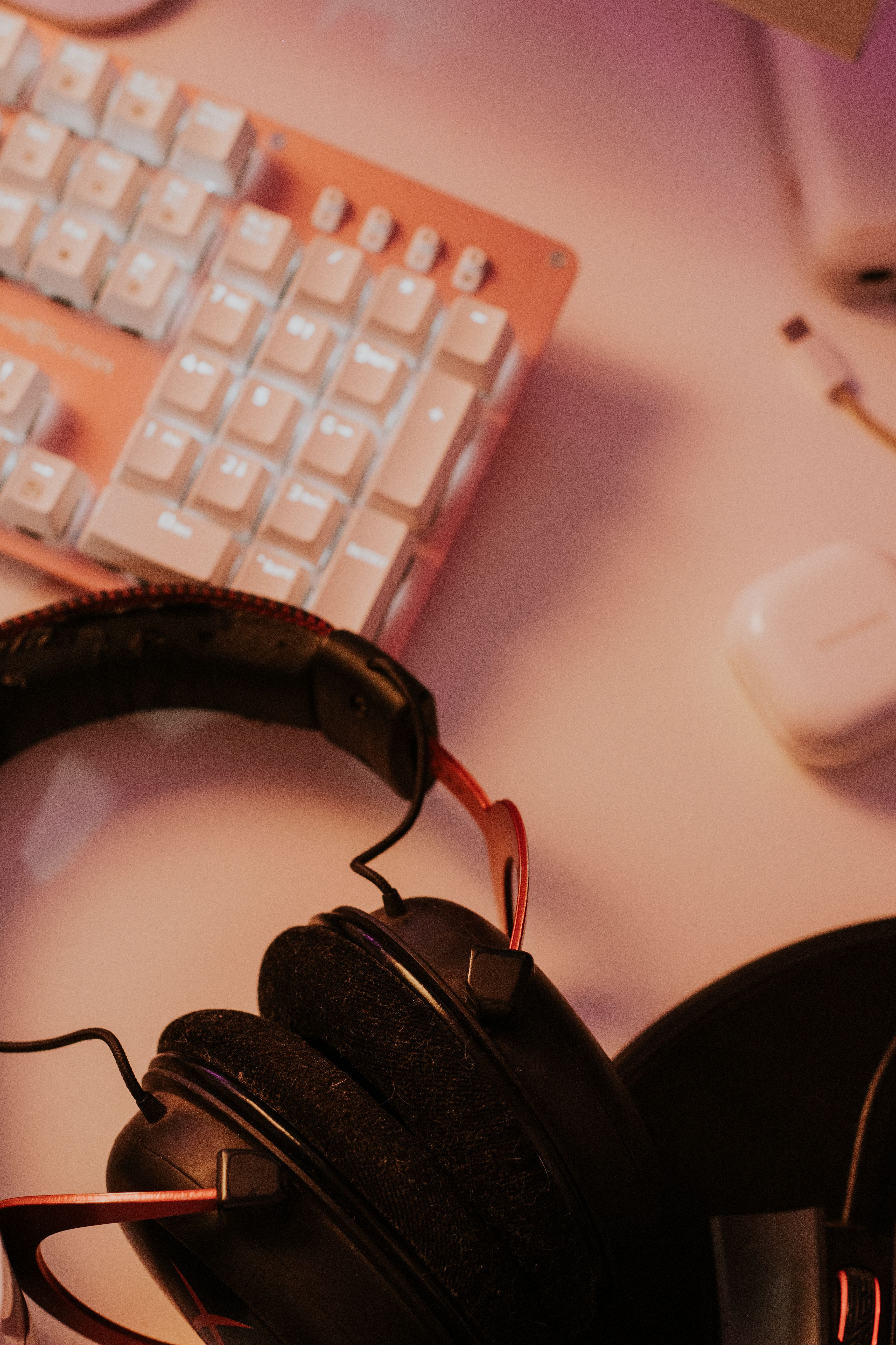 Open-back headphones next to closed-back headphones