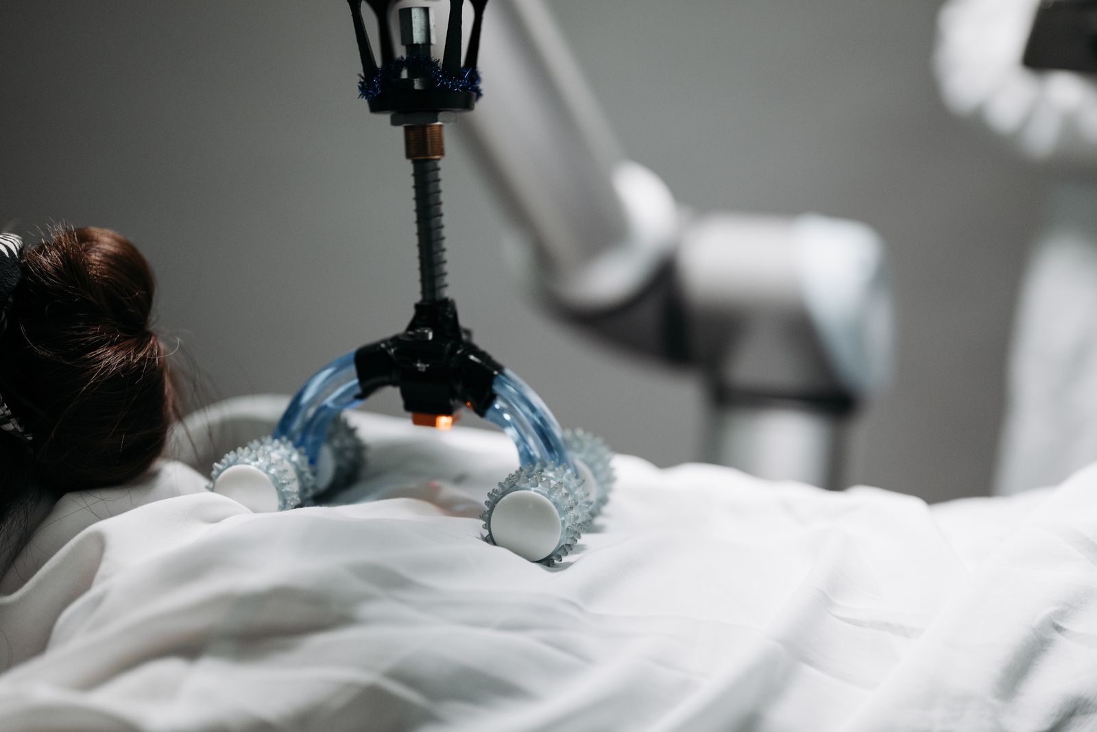 Shiatsu massage device being used on a person's back