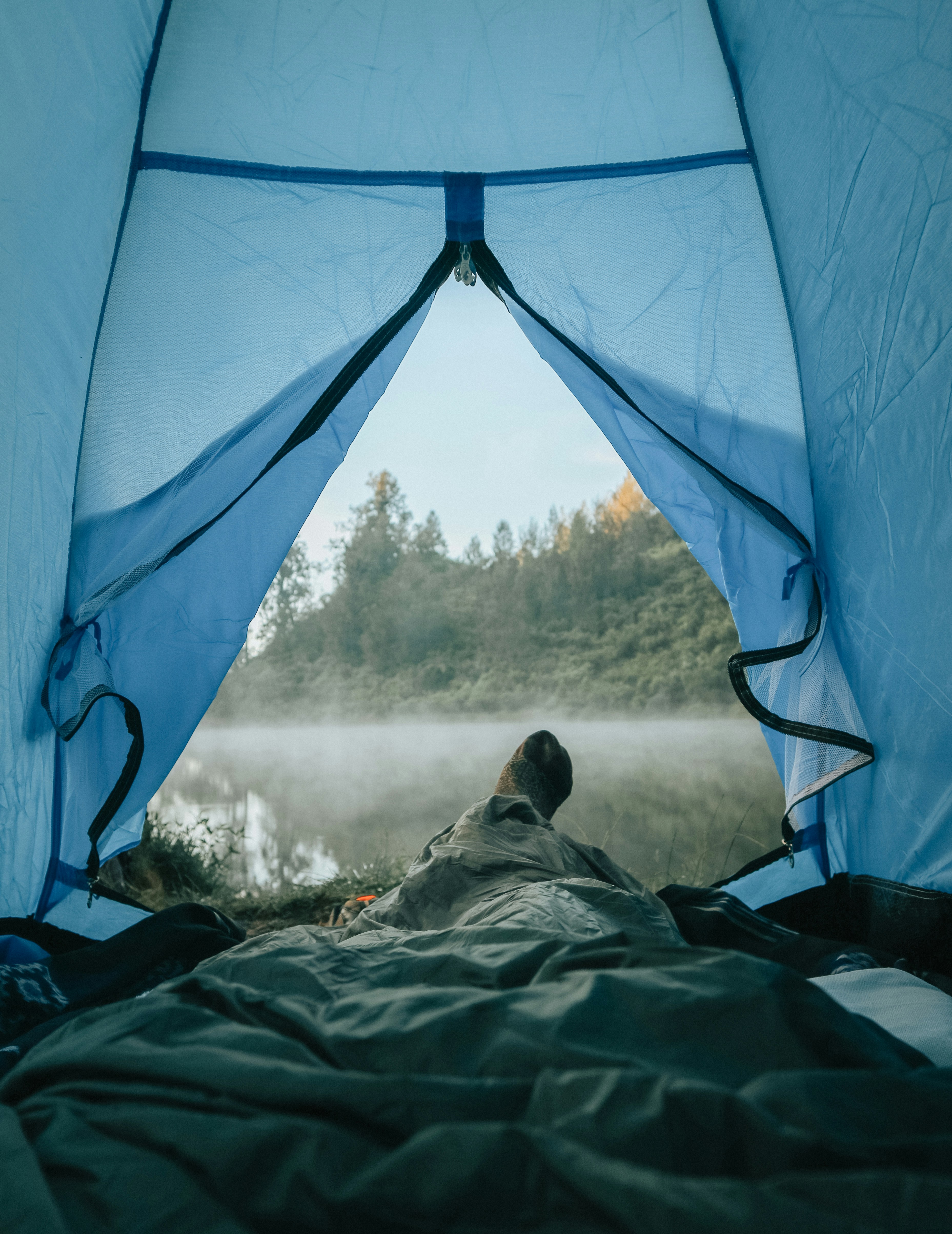 Sleeping pad rolled out inside a tent
